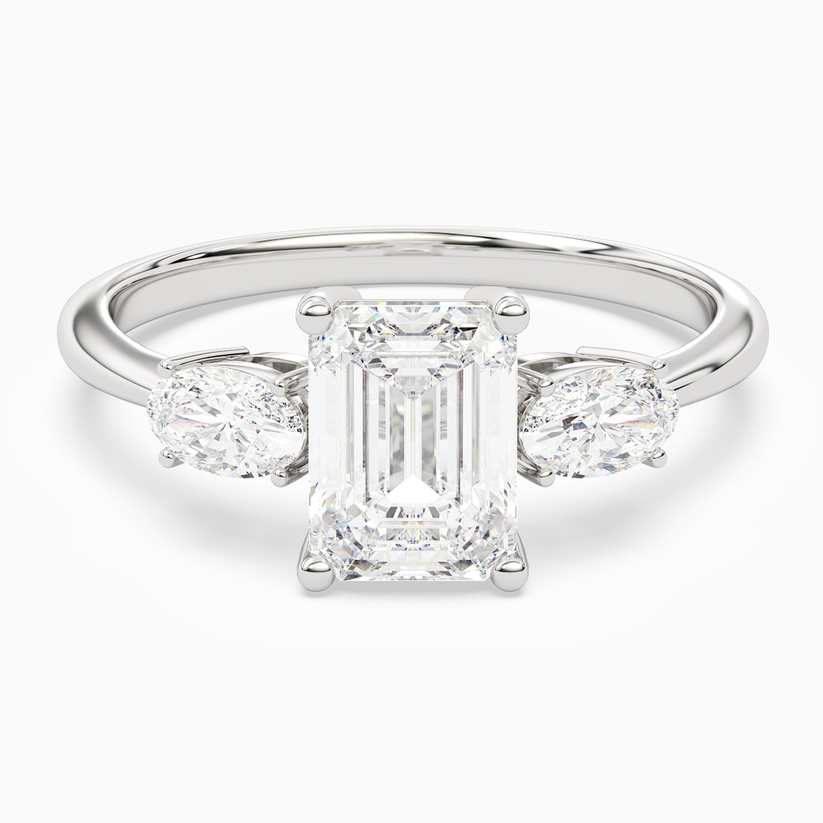 Emerald Classic Three Stone in Platinum main white