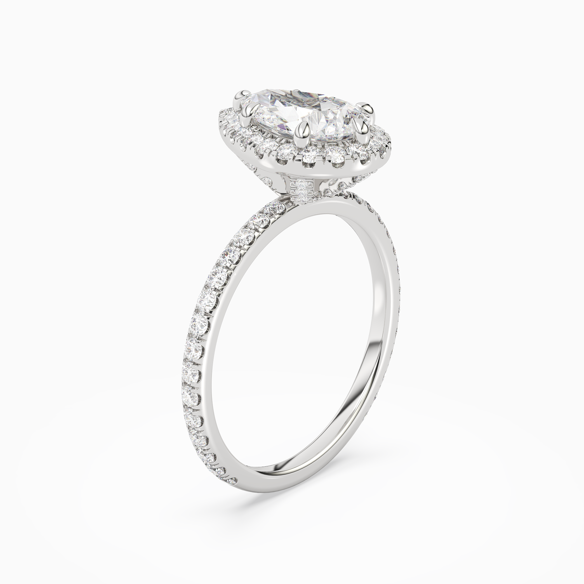 Pear Scalloped Halo Pavé in Platinum angled