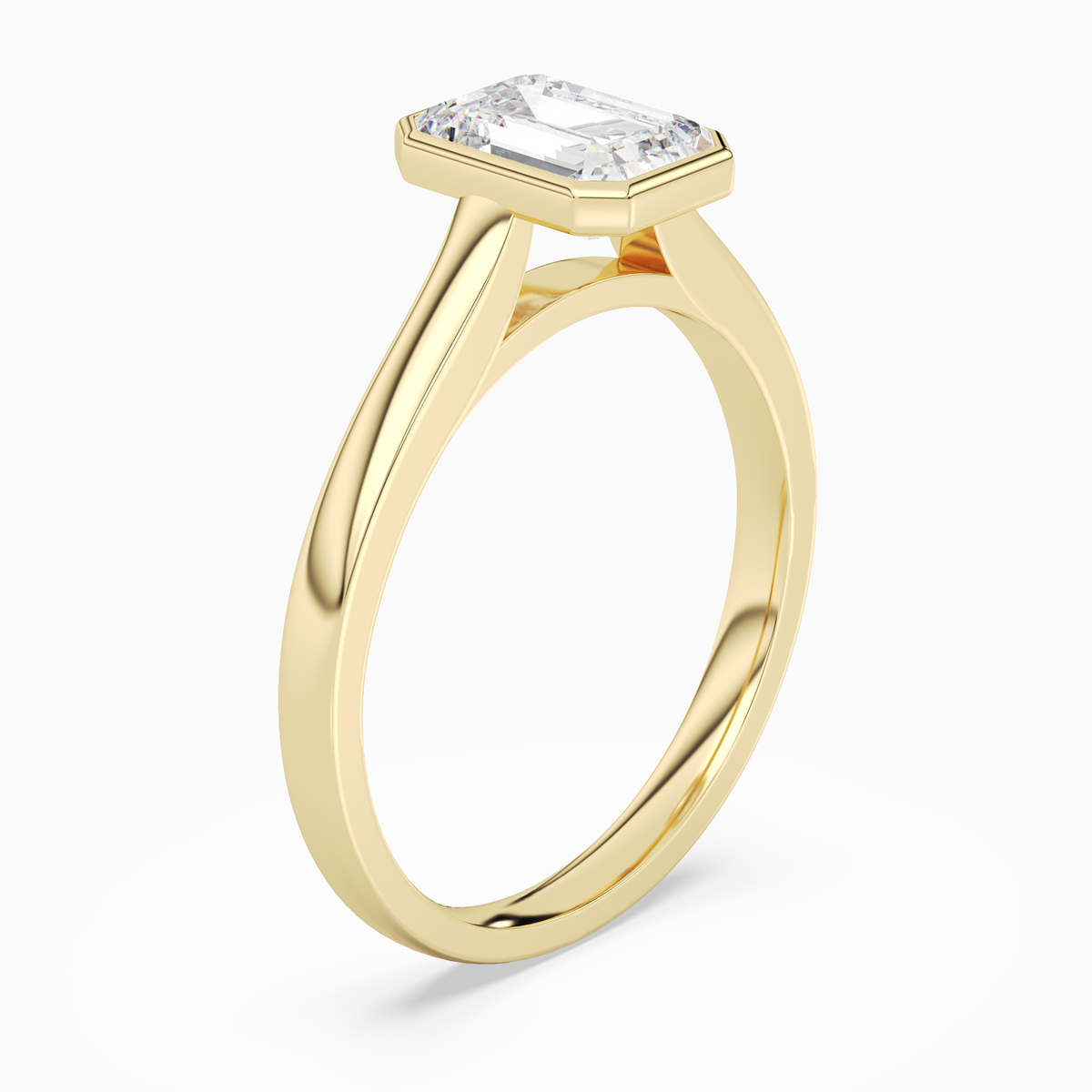 Emerald Medium Tapered Bezel Solitaire in 14K Yellow Gold angled