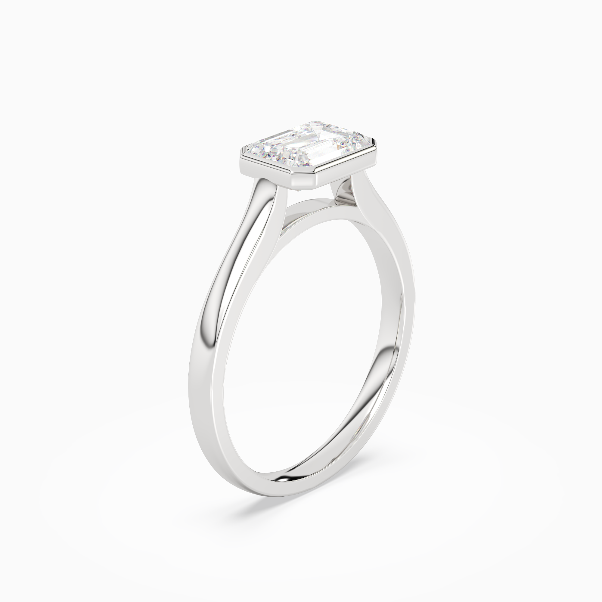 Emerald East-West Bezel Solitaire in 18K White Gold angled
