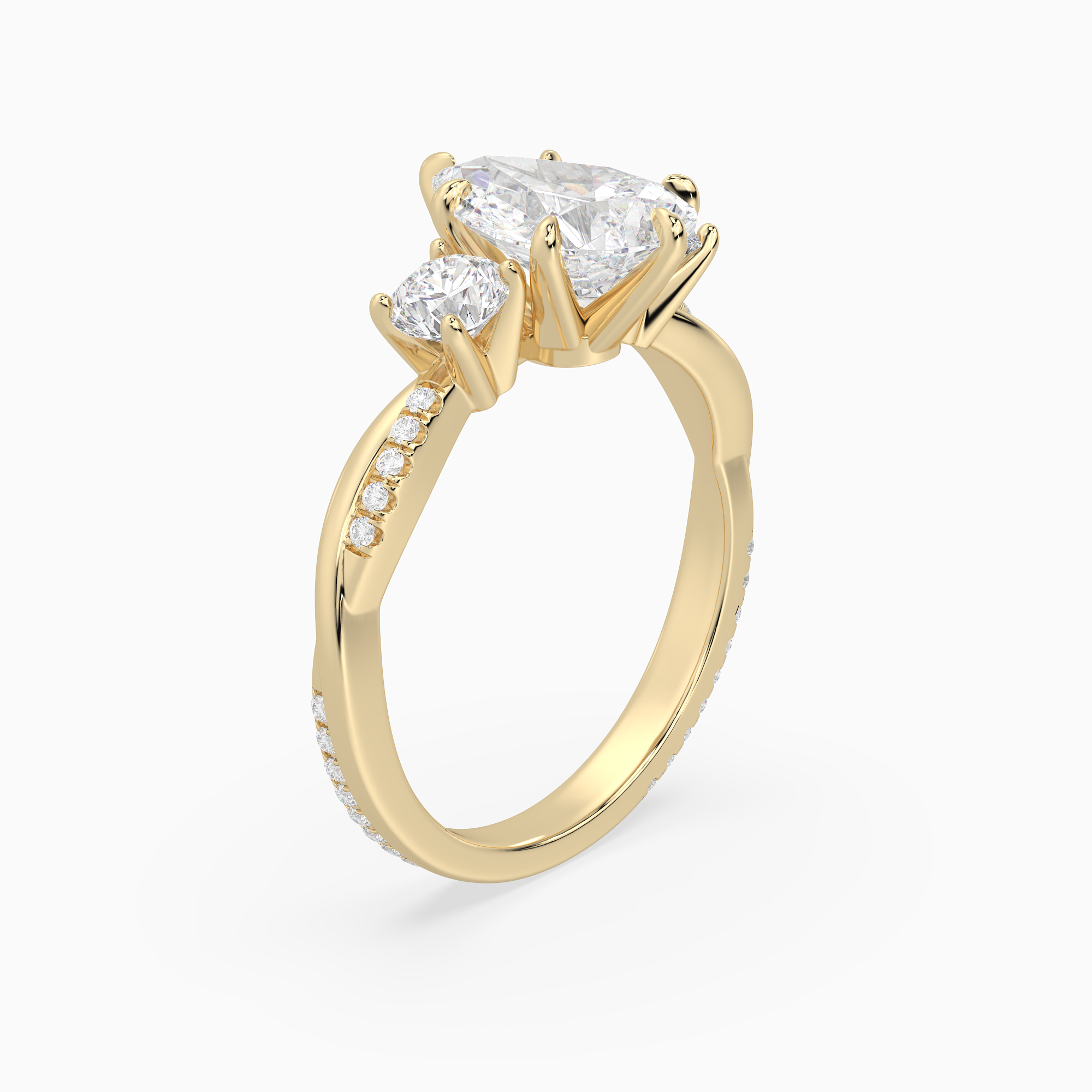 Pear Twisted Vine Three Stone in 18K Yellow Gold angled