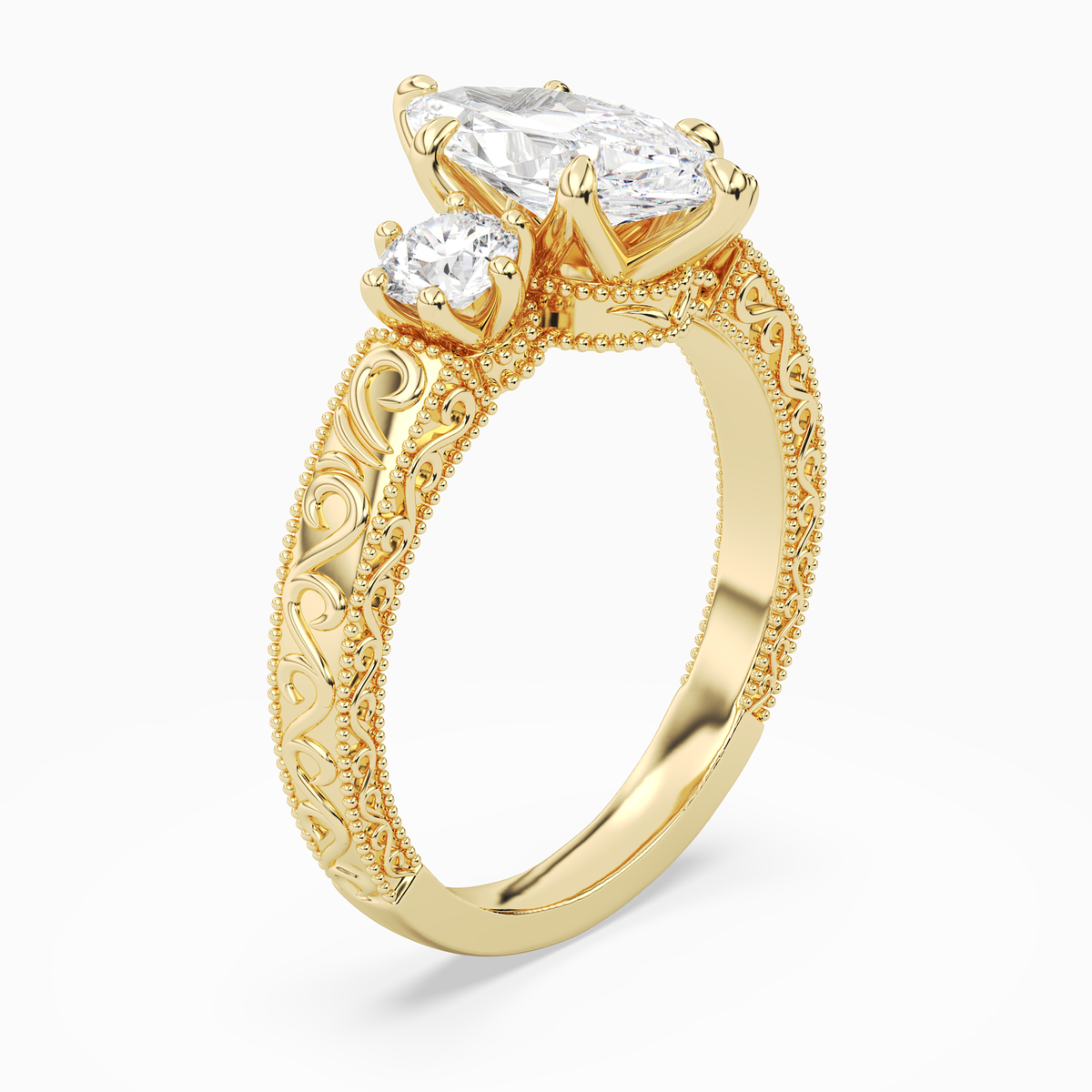 Marquise Engraved Vintage Three Stone in 18K Yellow Gold angled