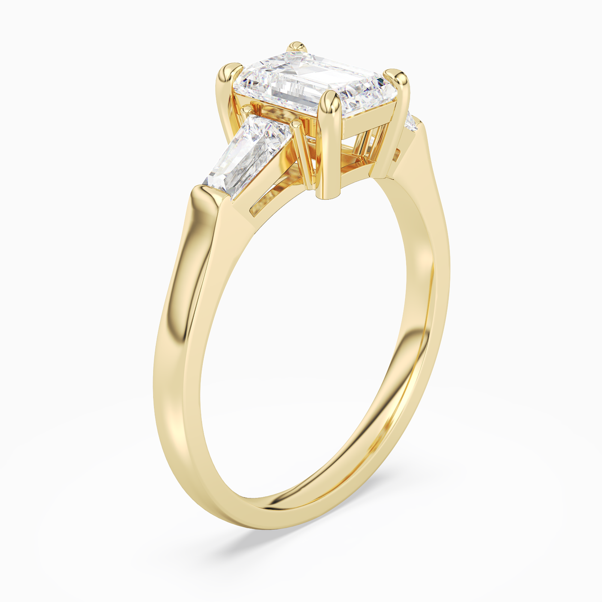 Emerald Baguette Three Stone Large Sides in 14K Yellow Gold angled