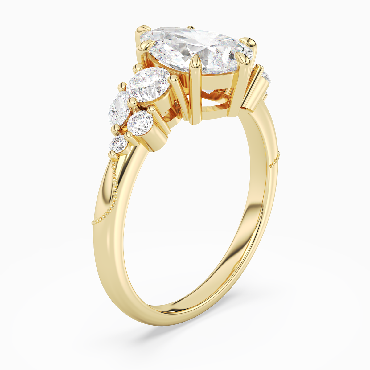 Pear Composite Three Stone Ring in 18K Yellow Gold angled