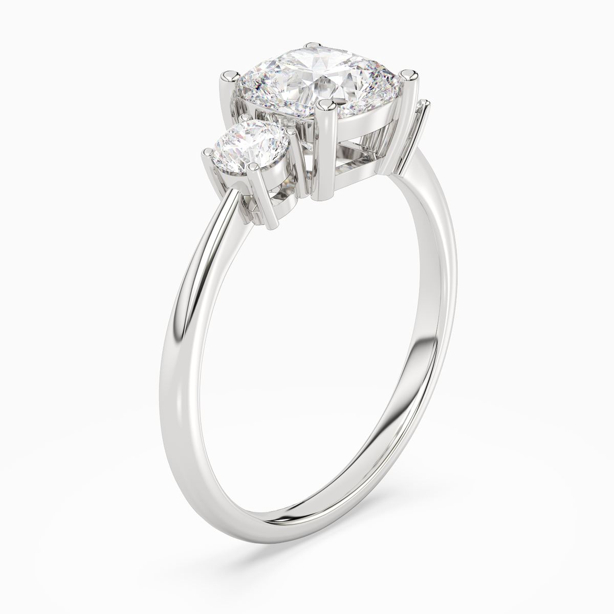 Cushion Classic Round Three Stone Large Sides in Platinum angled