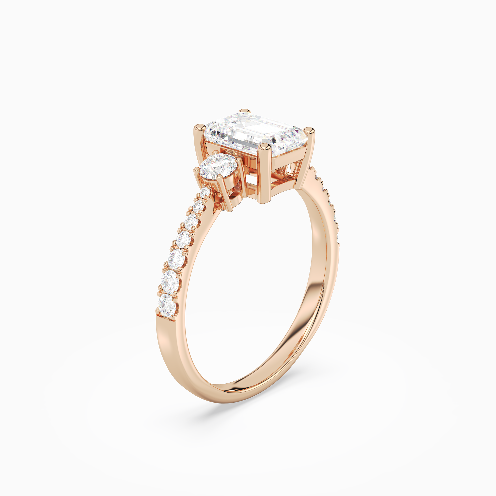 Emerald Classic Round Three Stone Pavé in 14K Rose Gold angled