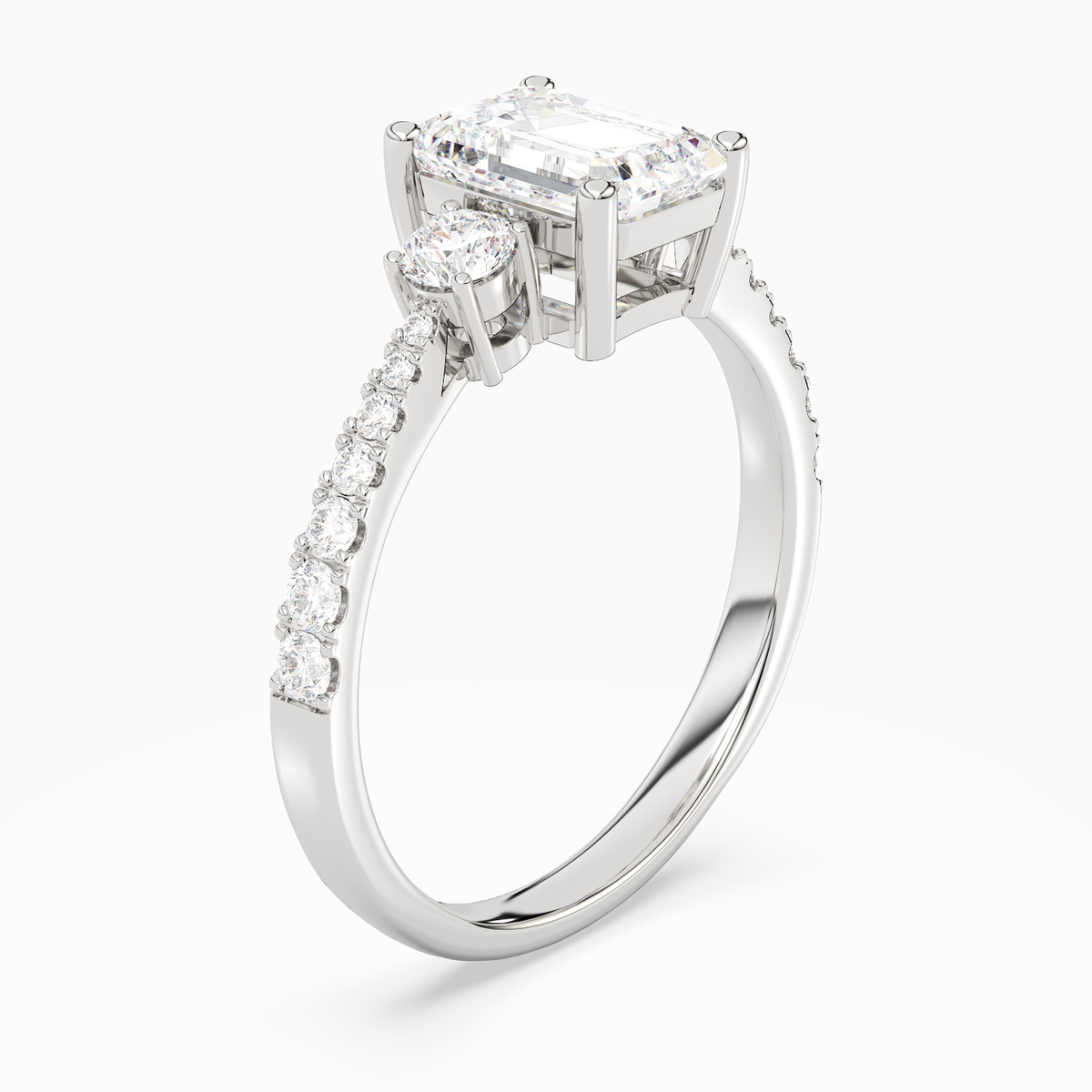 Emerald Classic Round Three Stone Pavé in 14K White Gold angled