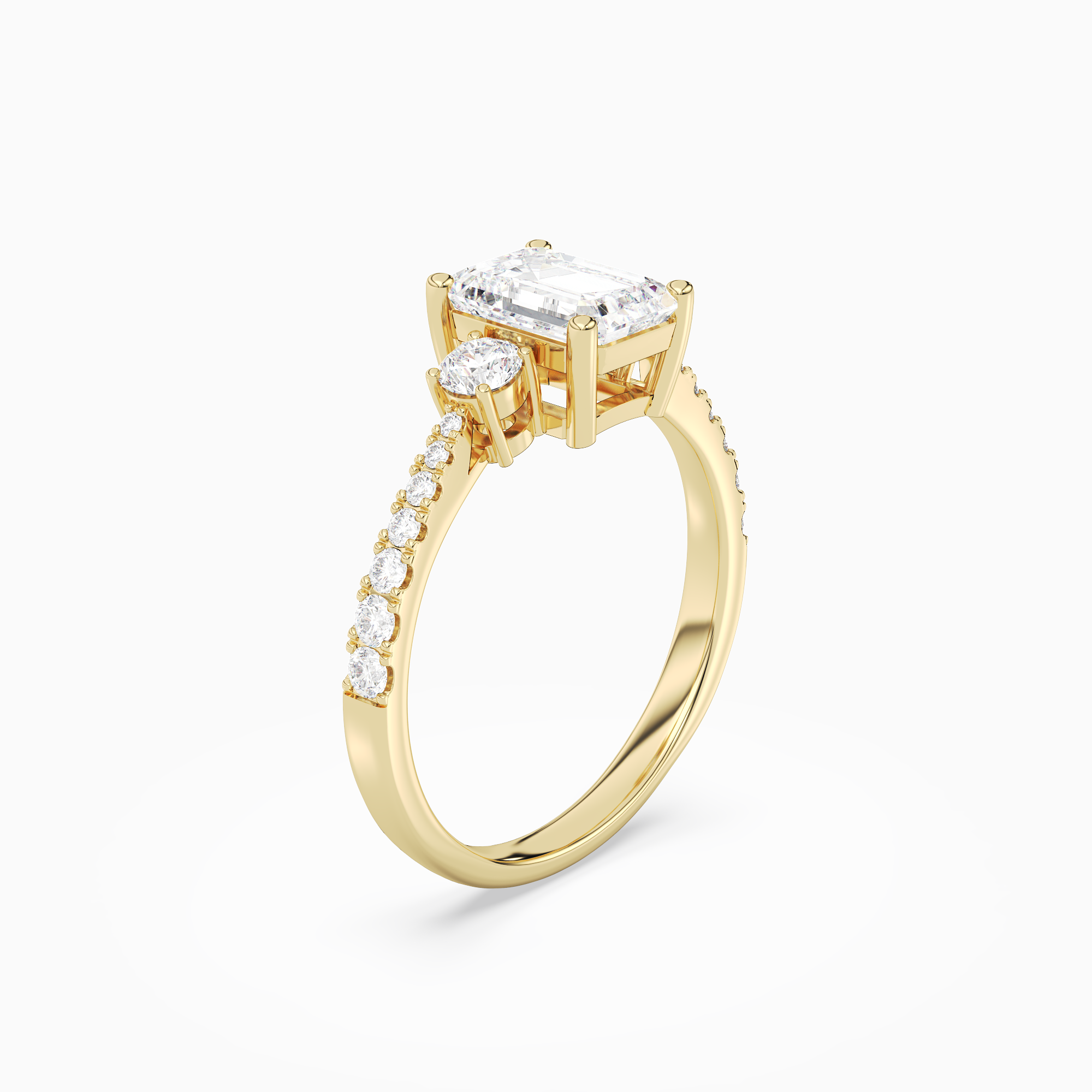 Emerald Classic Round Three Stone Pavé in 14K Yellow Gold angled