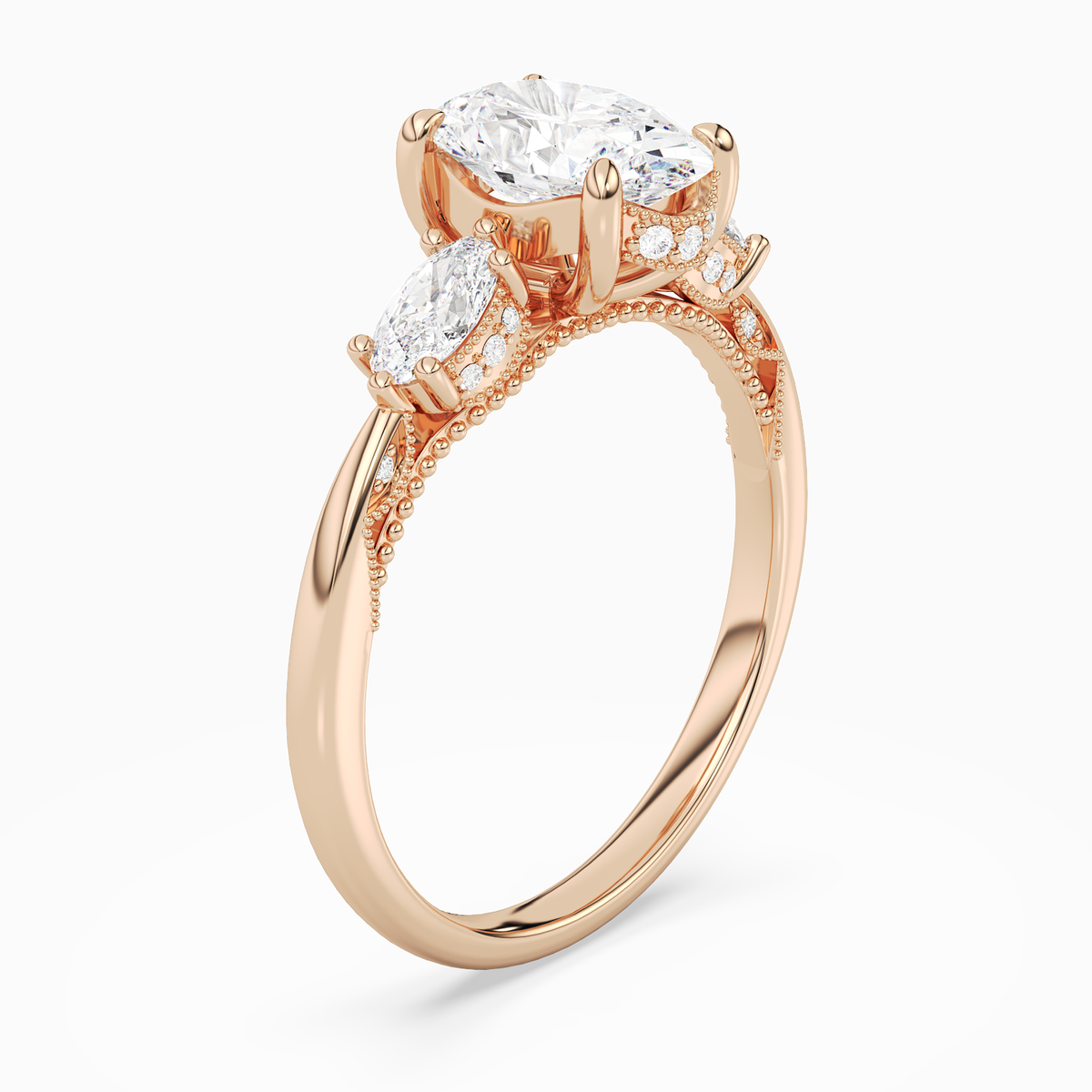 Oval Ornate Accented Three Stone in 14K Rose Gold angled