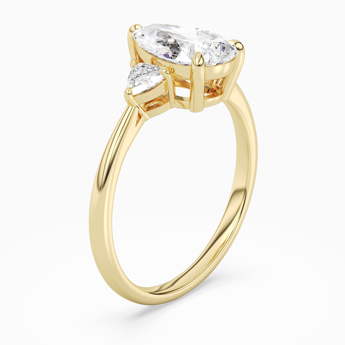 Pear Trillion Three Stone Large Sides in 18K Yellow Gold angled