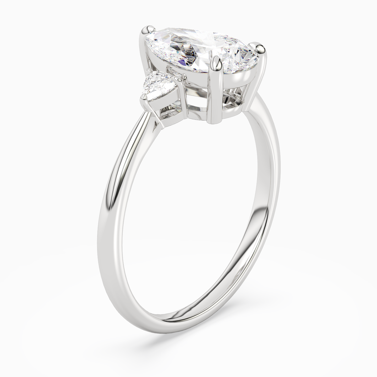 Pear Trillion Three Stone Small Sides in 18K White Gold angled
