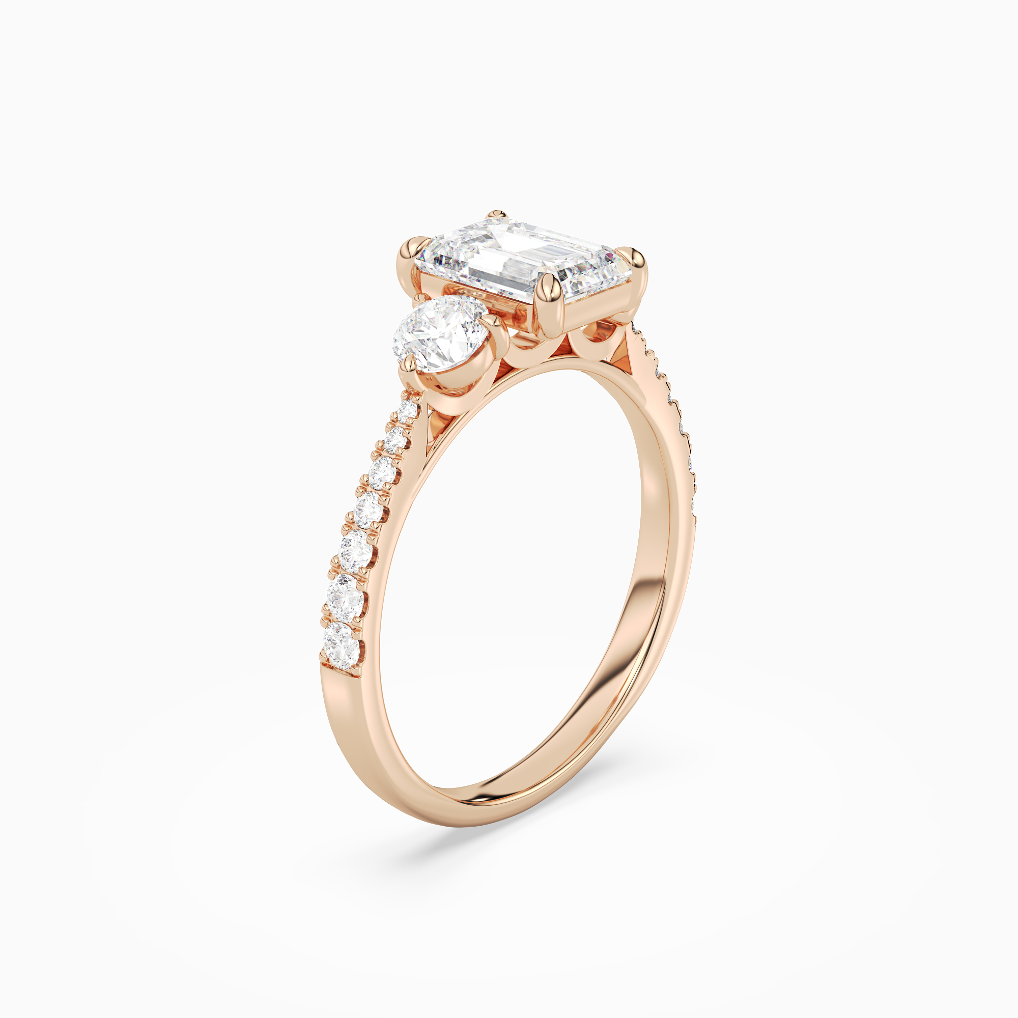Emerald Round Side Three Stone Pavé in 14K Rose Gold angled