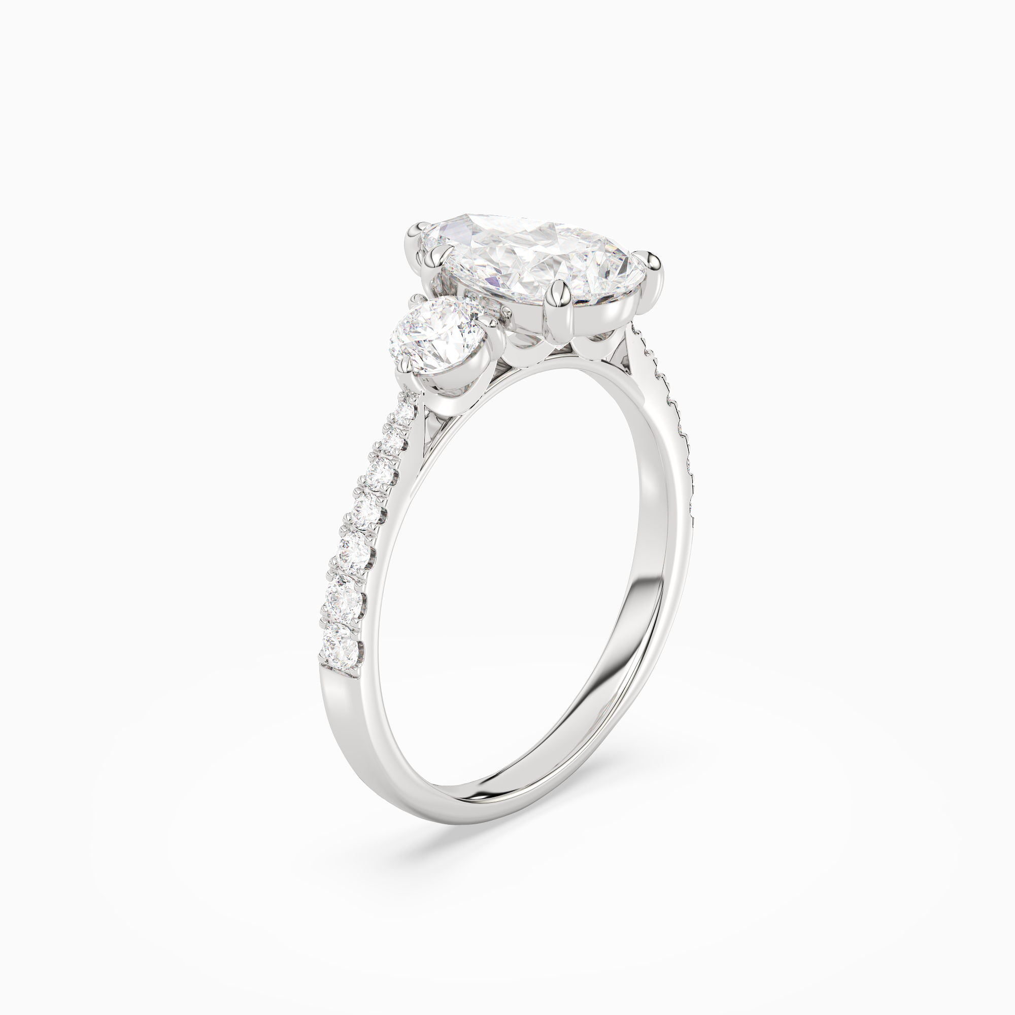 Pear Round Side Three Stone Pavé in 18K White Gold angled