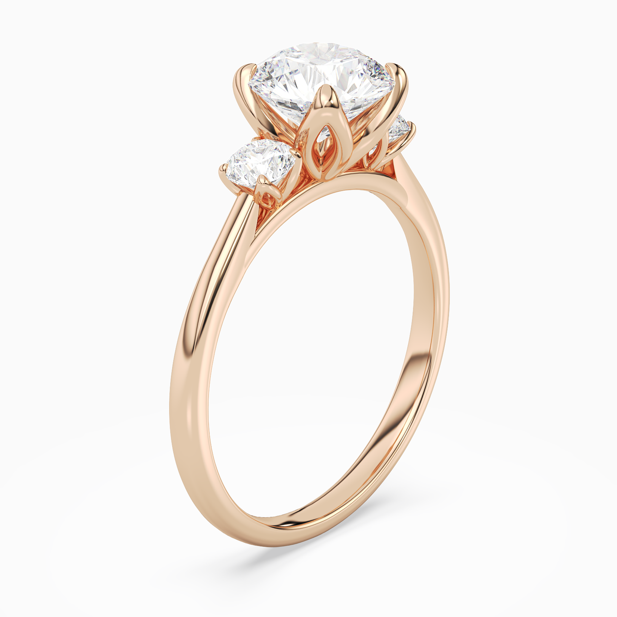 Round Pear Three-Stone with Round Sides in 14K Rose Gold angled