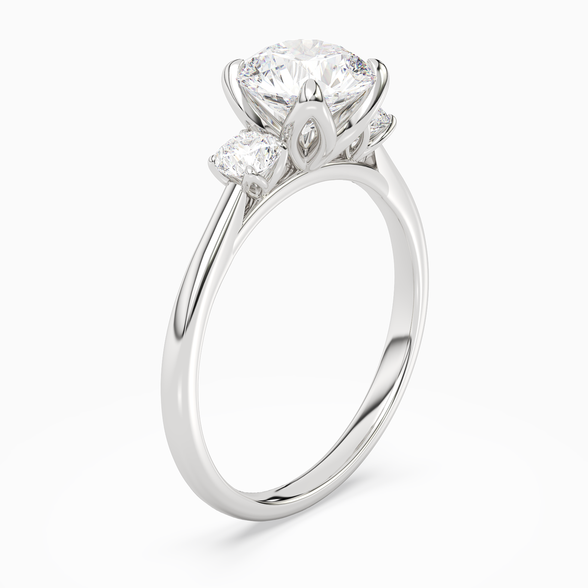 Round Pear Three-Stone with Round Sides in 18K White Gold angled
