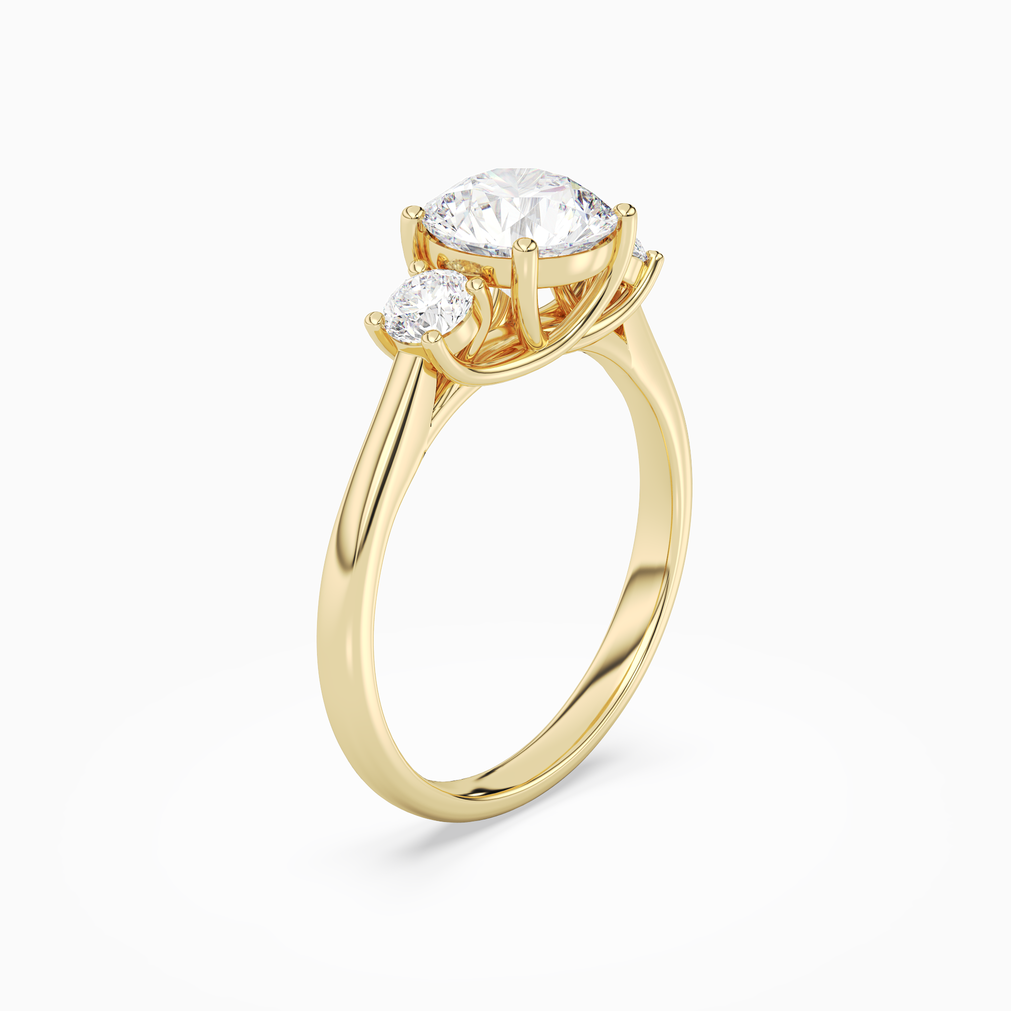 Round Round Three-Stone with Pear Sides in 14K Yellow Gold angled