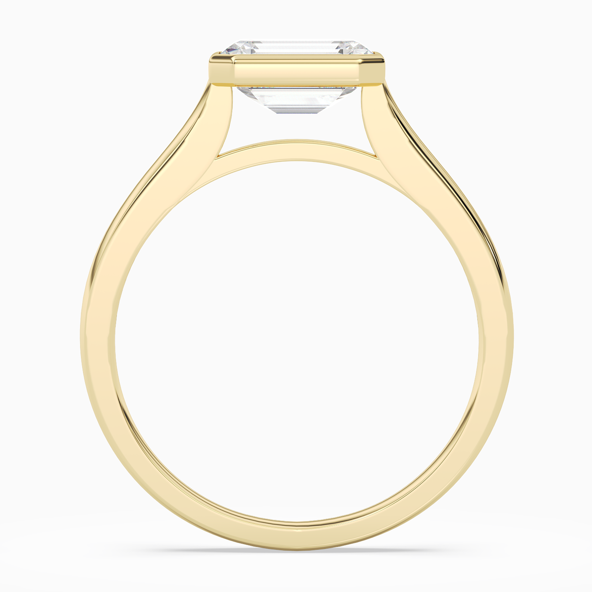 Emerald East-West Bezel Solitaire in 18K Yellow Gold side profile