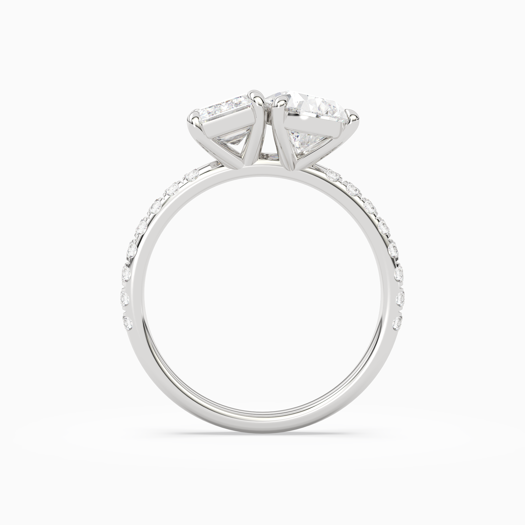 Emerald & Pear Accented Toi Et Moi in Platinum side profile