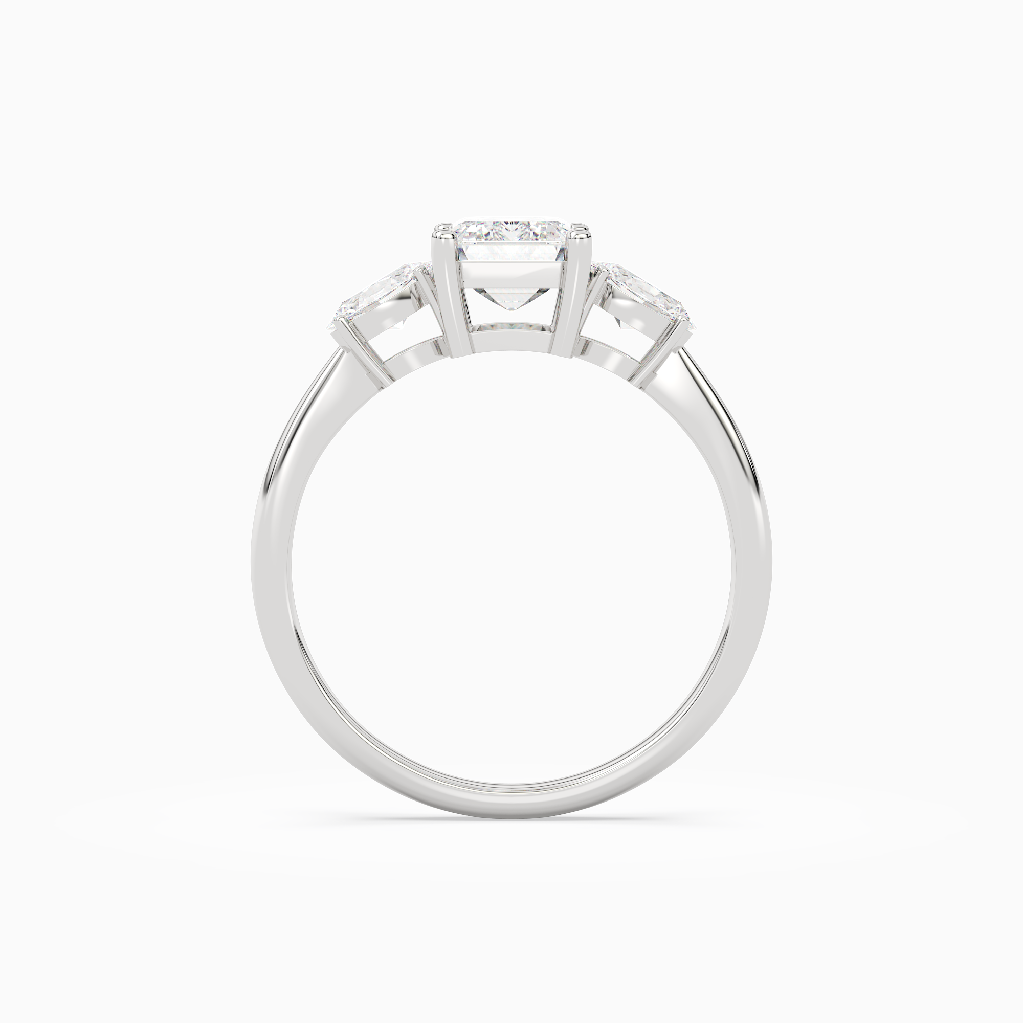 Emerald Classic Three Stone in Platinum side profile