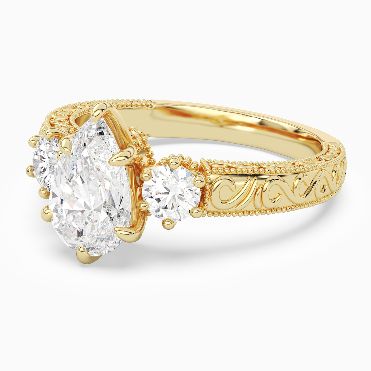 Pear Engraved Vintage Three Stone in 14K Yellow Gold top angle