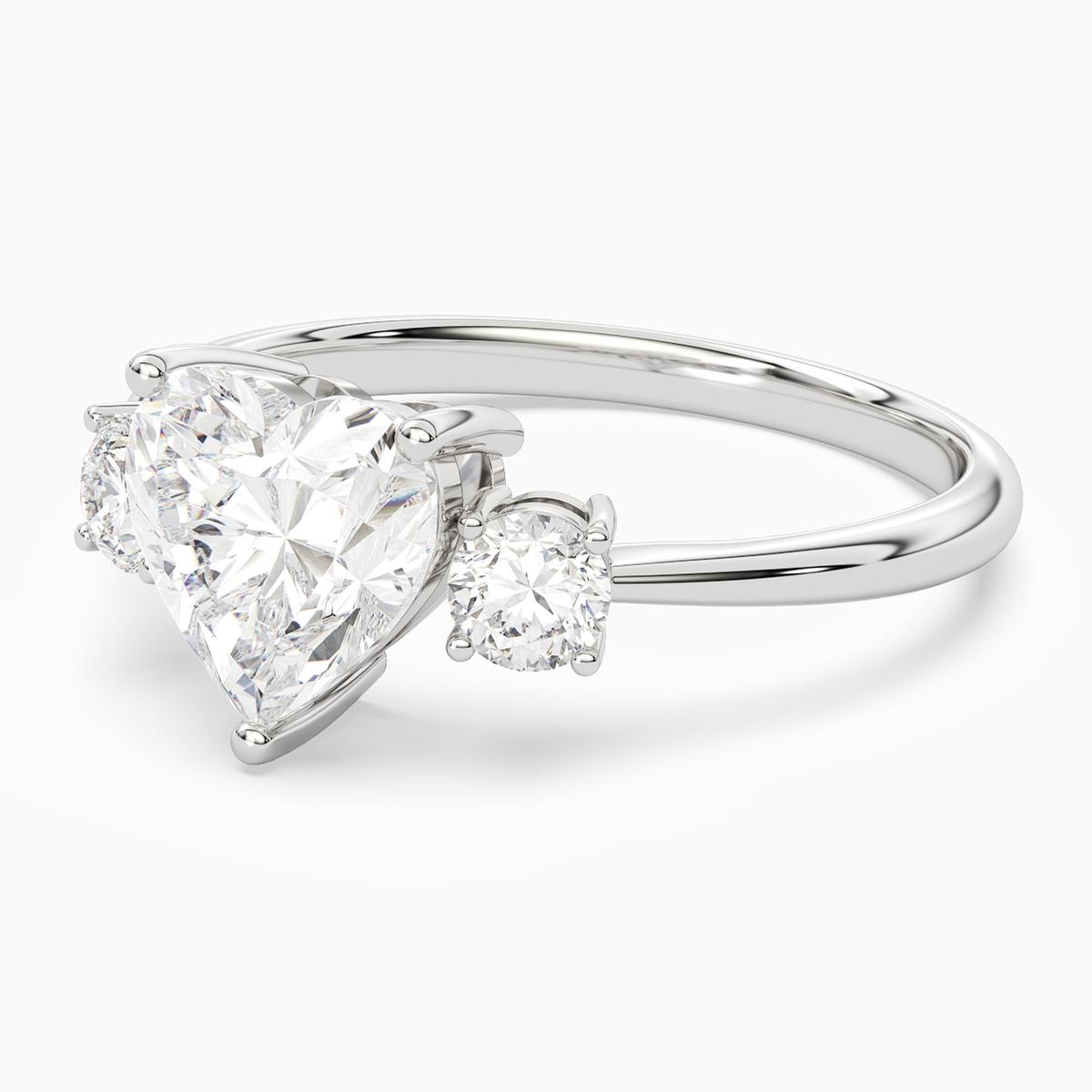 Heart Classic Round Three Stone Large Sides in Platinum top angle