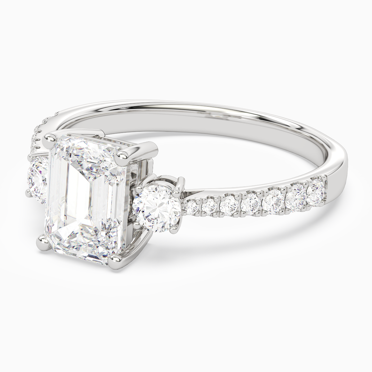 Emerald Classic Round Three Stone Pavé in 14K White Gold top angle