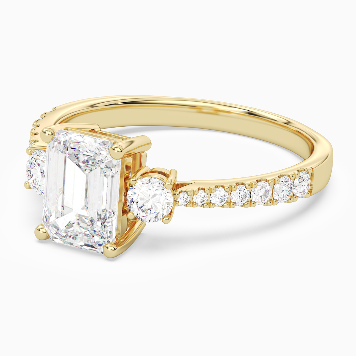Emerald Classic Round Three Stone Pavé in 18K Yellow Gold top angle