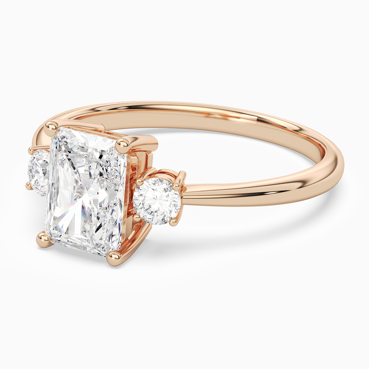 Radiant Classic Round Three Stone Small Sides in 14K Rose Gold top angle