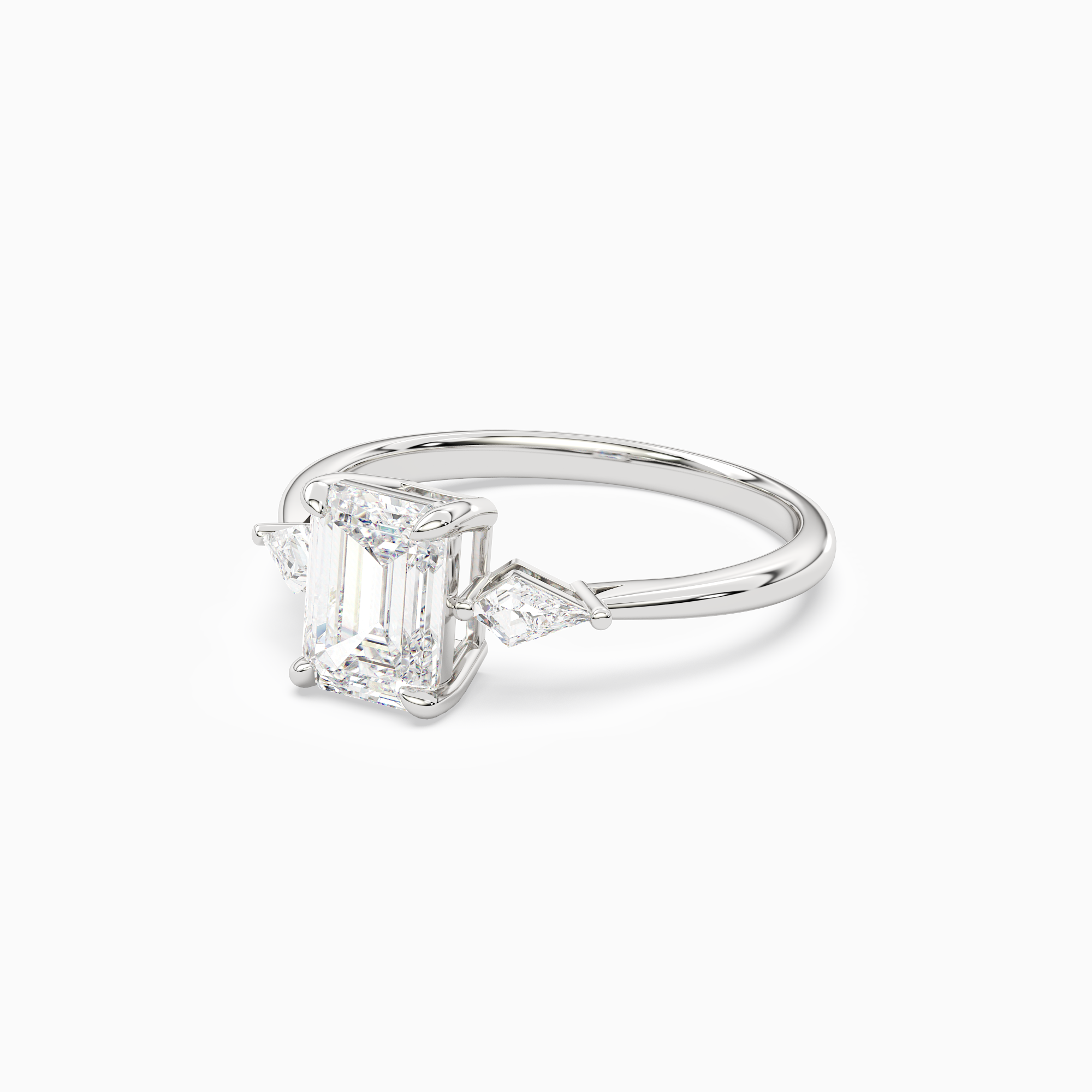 Emerald Kite Side Three Stone Small Sides in Platinum top angle