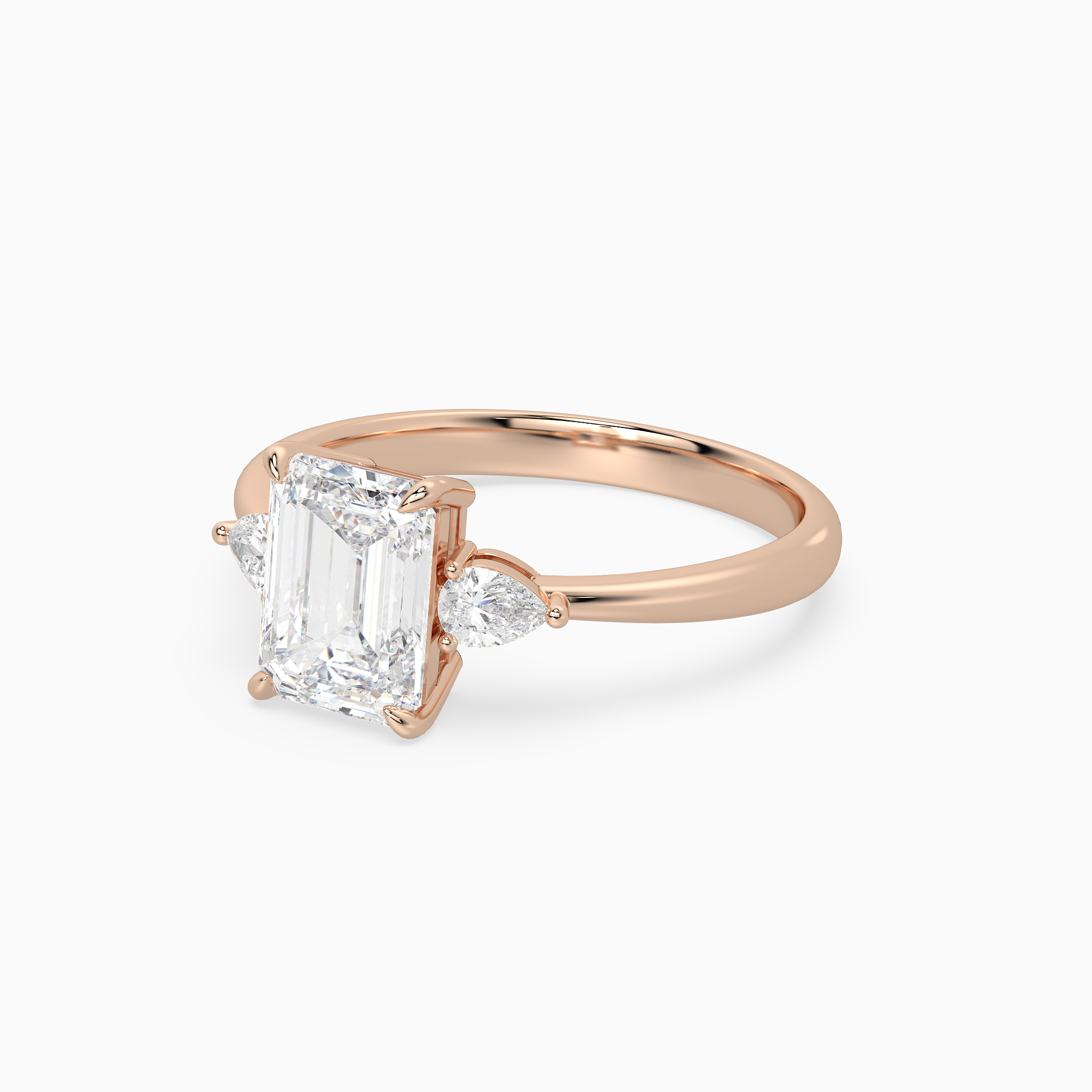 Emerald Pear Side Three Stone Classic in 14K Rose Gold top angle