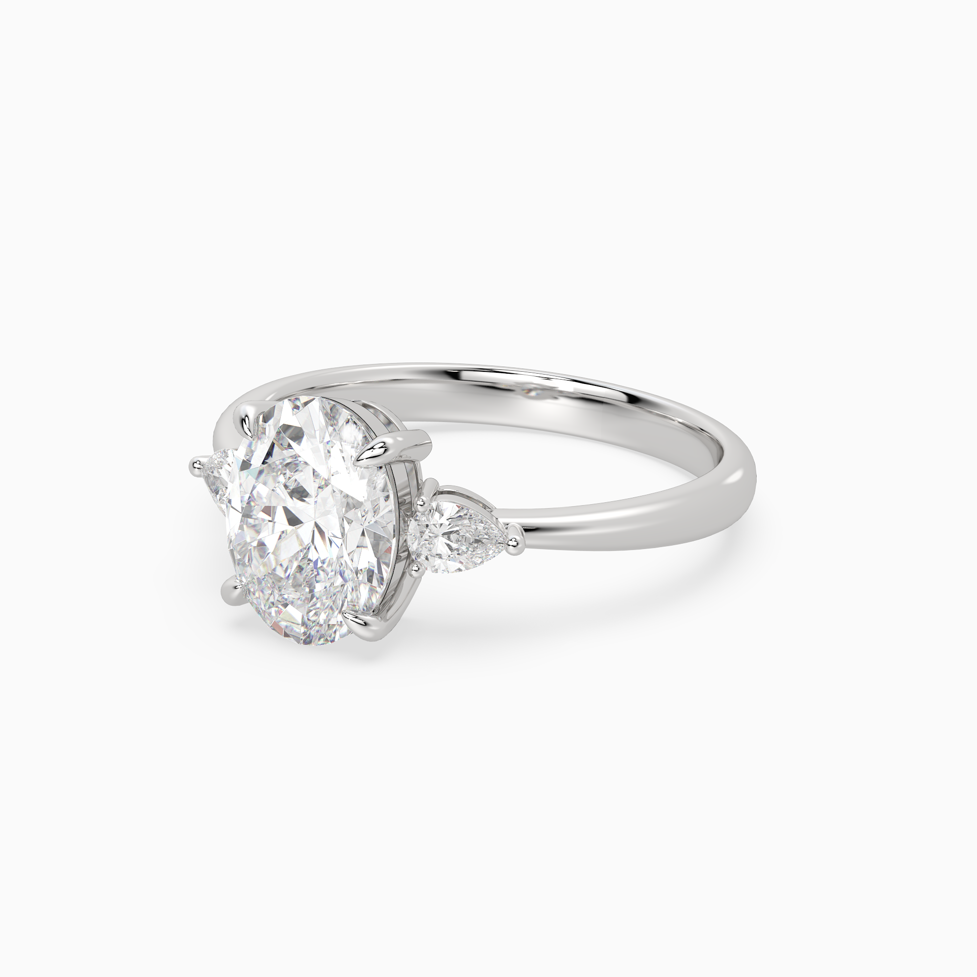 Oval Pear Side Three Stone Classic in 14K White Gold top angle