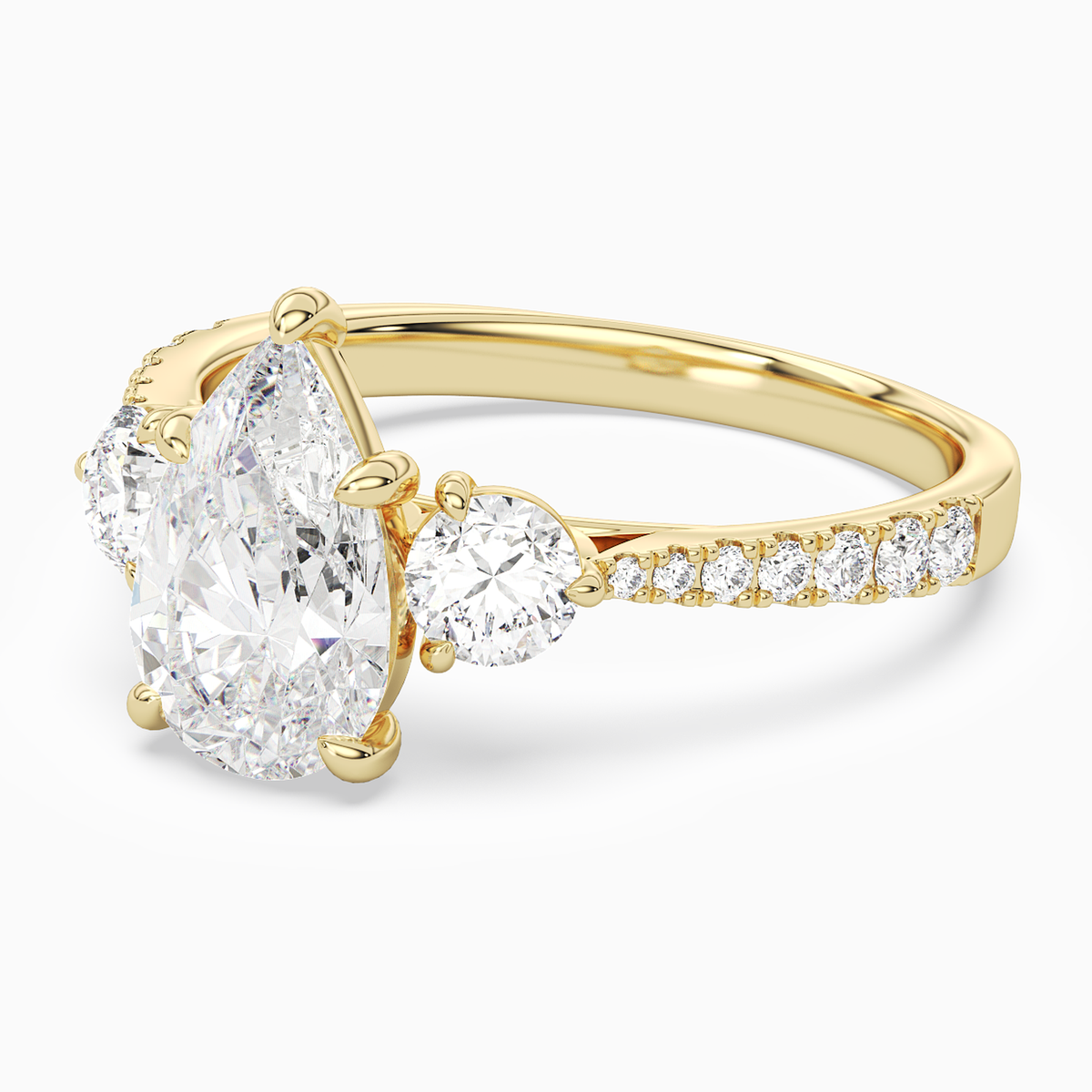 Pear Round Side Three Stone Pavé in 18K Yellow Gold top angle