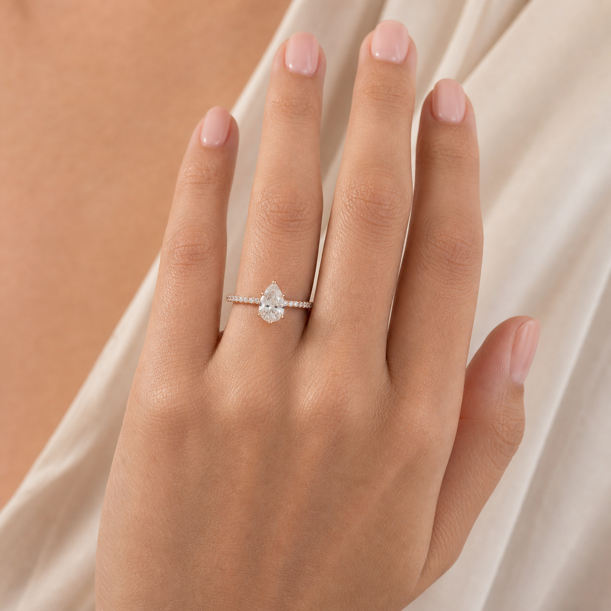 Pear Hidden Halo Crown Pavé in 14K Rose Gold wearing