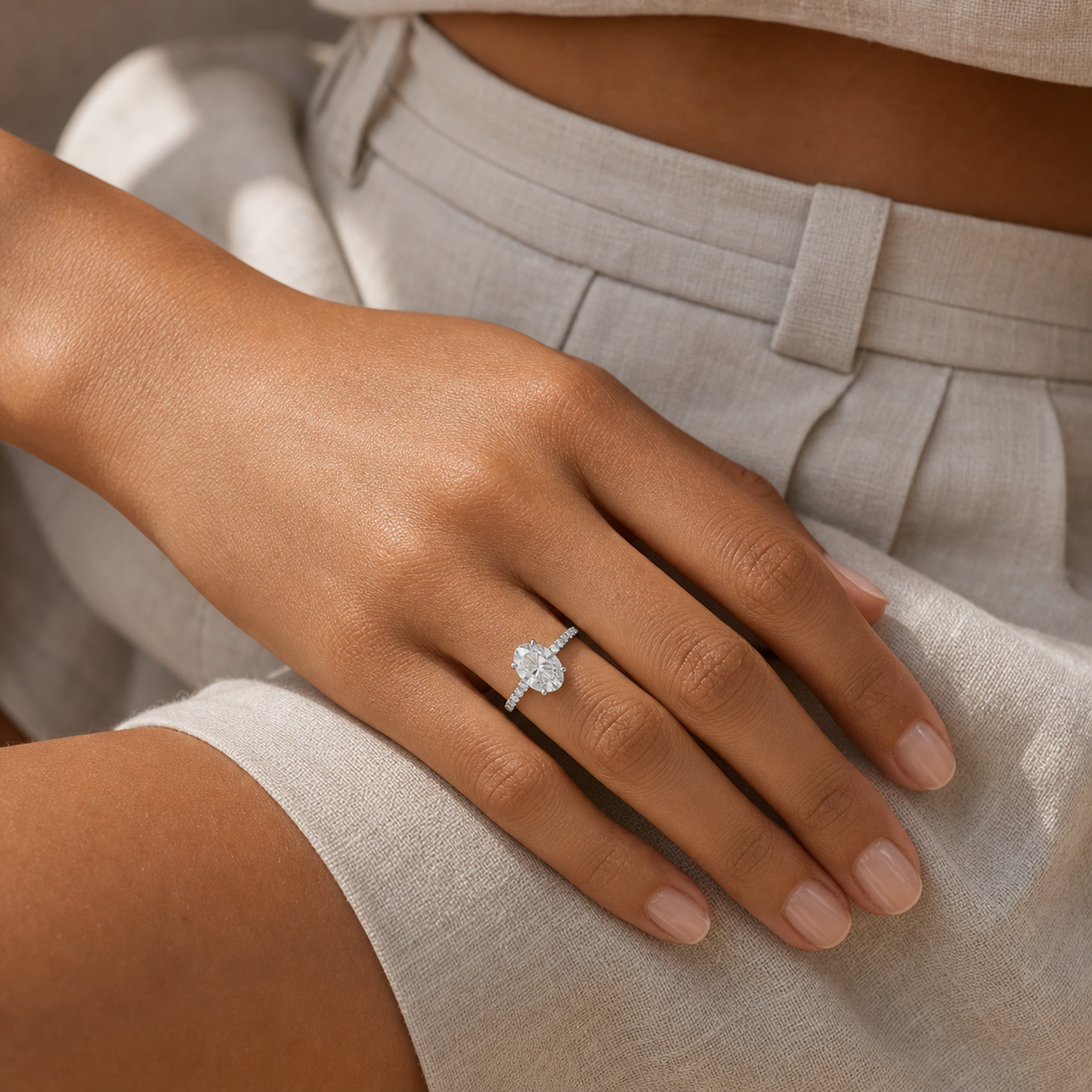 Oval Hidden Halo Crown Petite Pavé in Platinum wearing