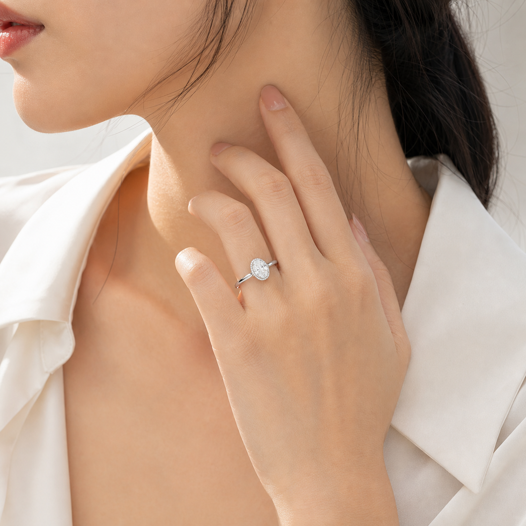 Oval Milgrain Bezel Solitaire in 14K White Gold wearing