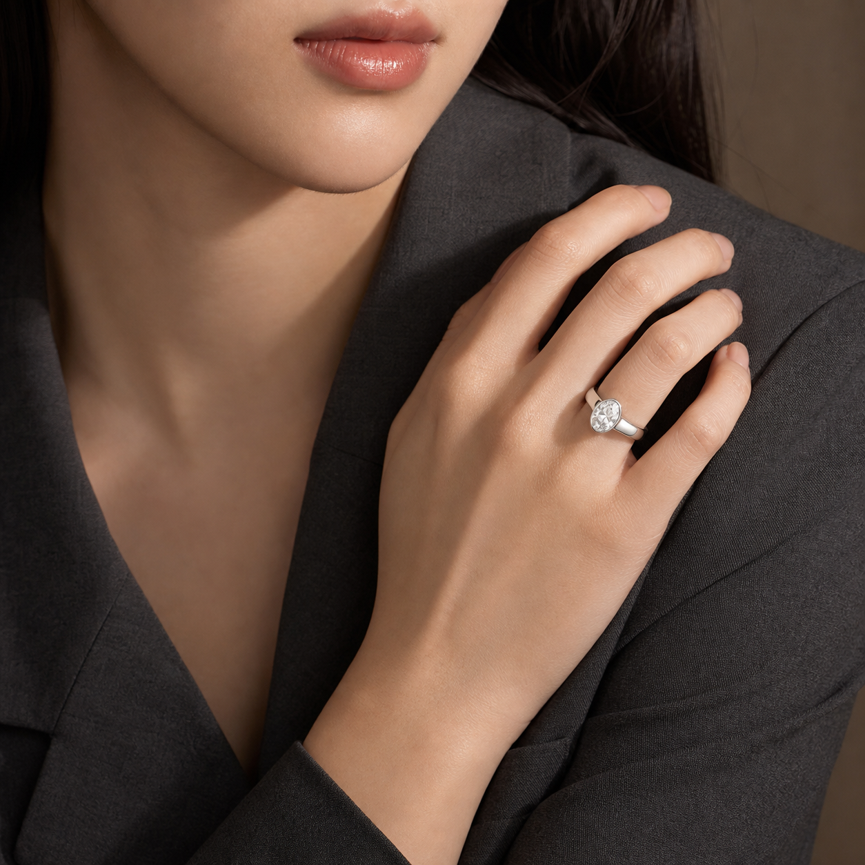 Oval Wide Tapered Bezel Solitaire in Platinum wearing