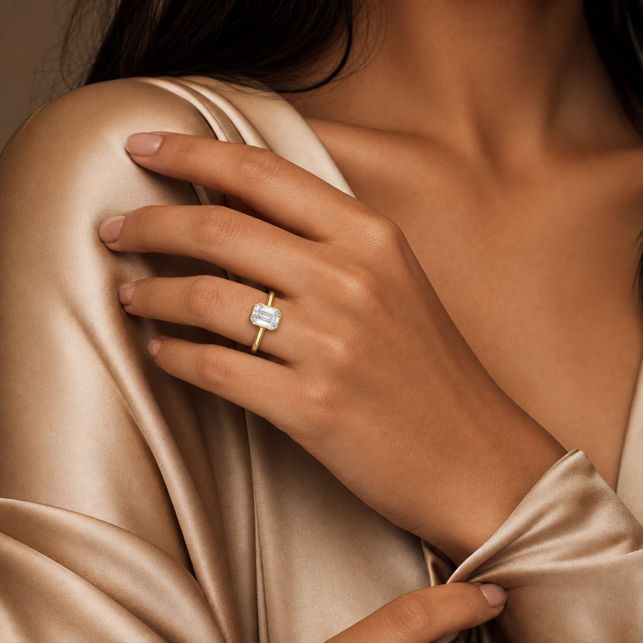 Emerald Medium Tapered Bezel Solitaire in 18K Yellow Gold wearing