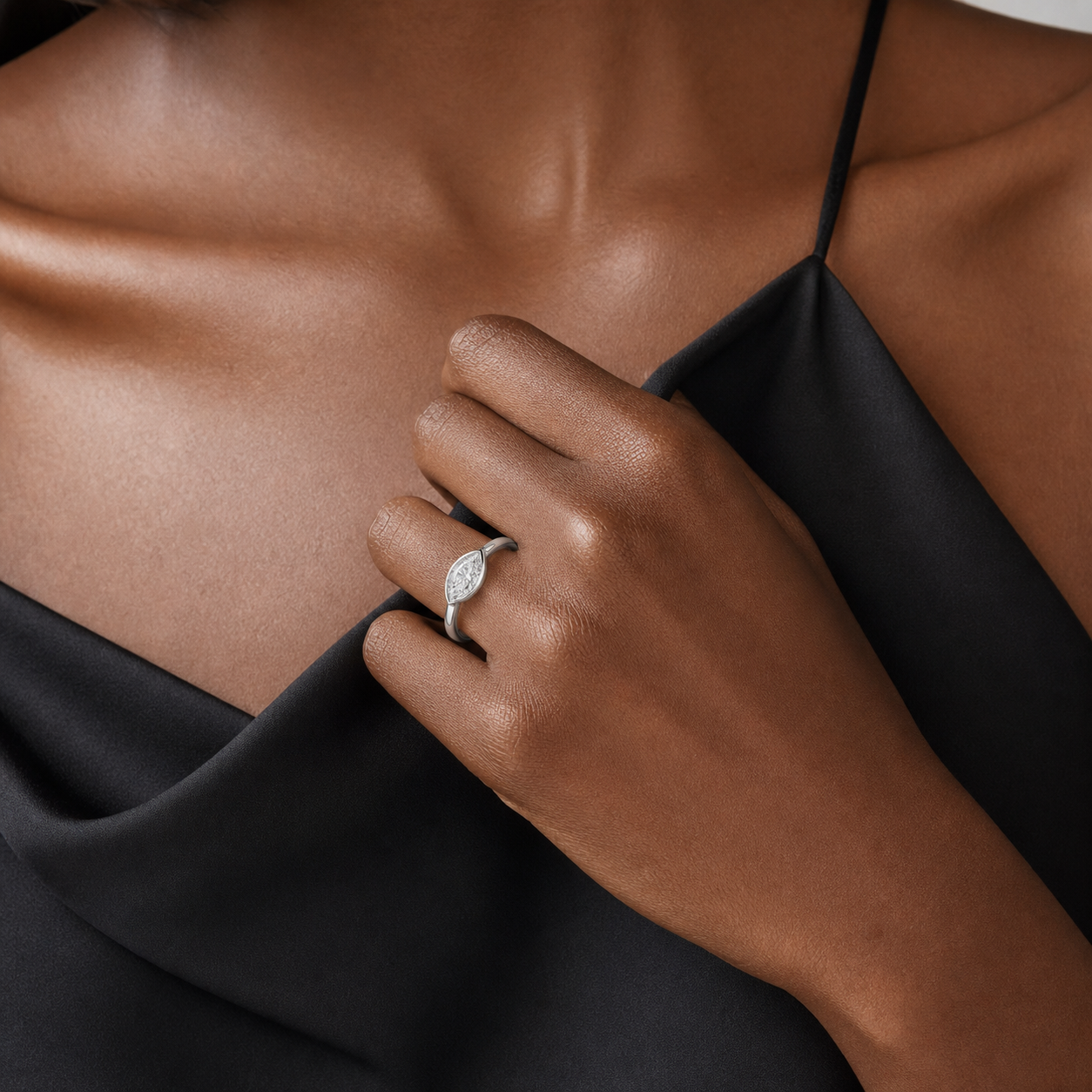 Marquise East-West Bezel Solitaire in 18K White Gold wearing