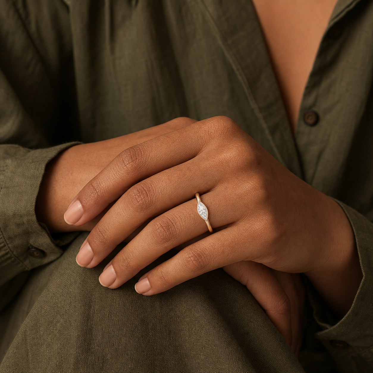 Marquise East-West Bezel Solitaire in 18K Yellow Gold wearing