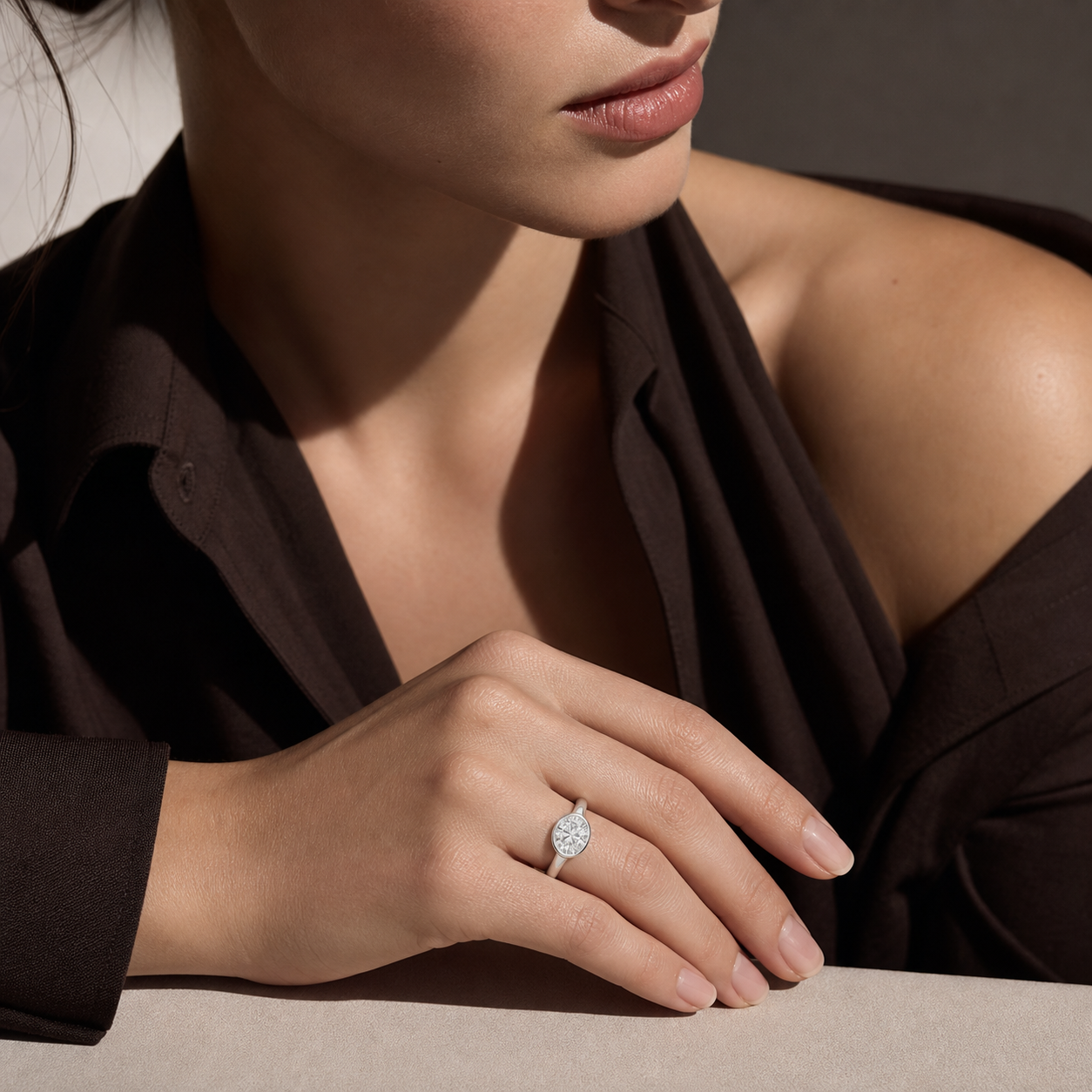 Oval East-West Bezel Solitaire in 18K White Gold wearing