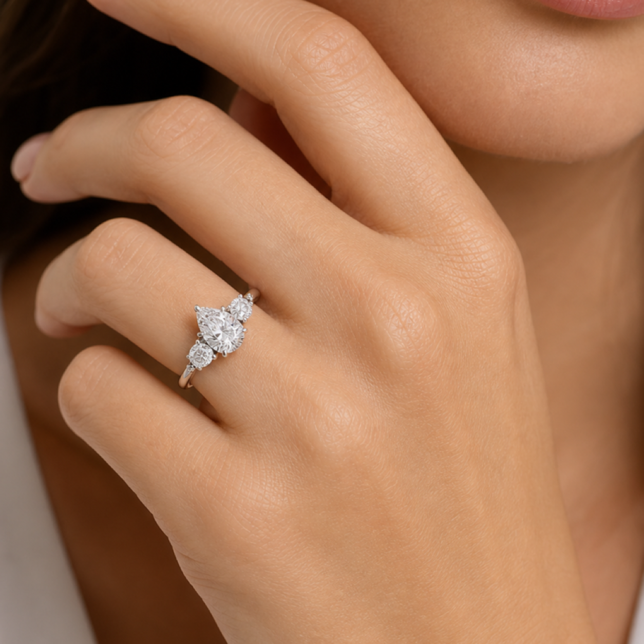 Pear Composite Three Stone Ring in Platinum wearing