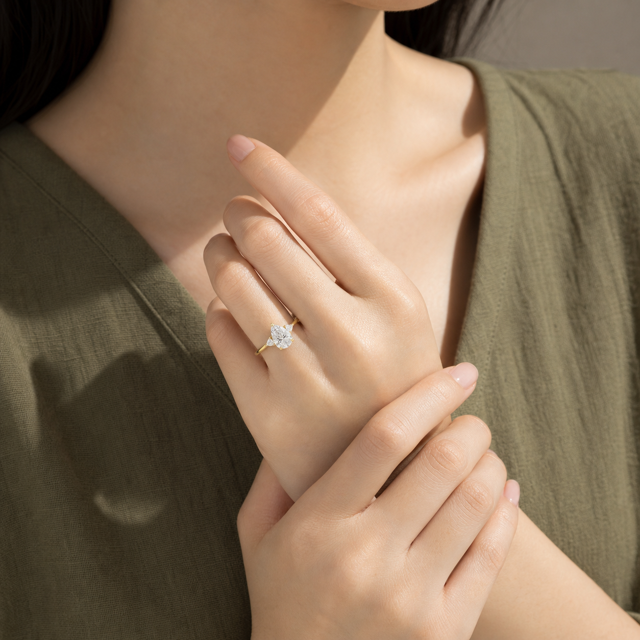 Pear Trillion Three Stone Small Sides in 14K Yellow Gold wearing