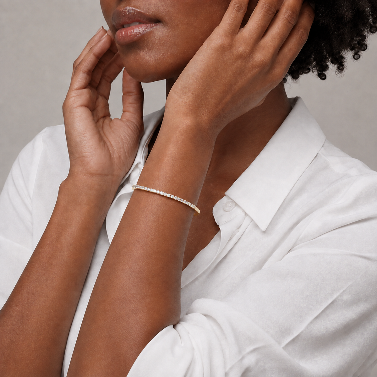 Ciela Brilliant Half Tennis Bangle Lab-Grown Diamond Tennis Bracelet in 14K Yellow Gold, worn on wrist
