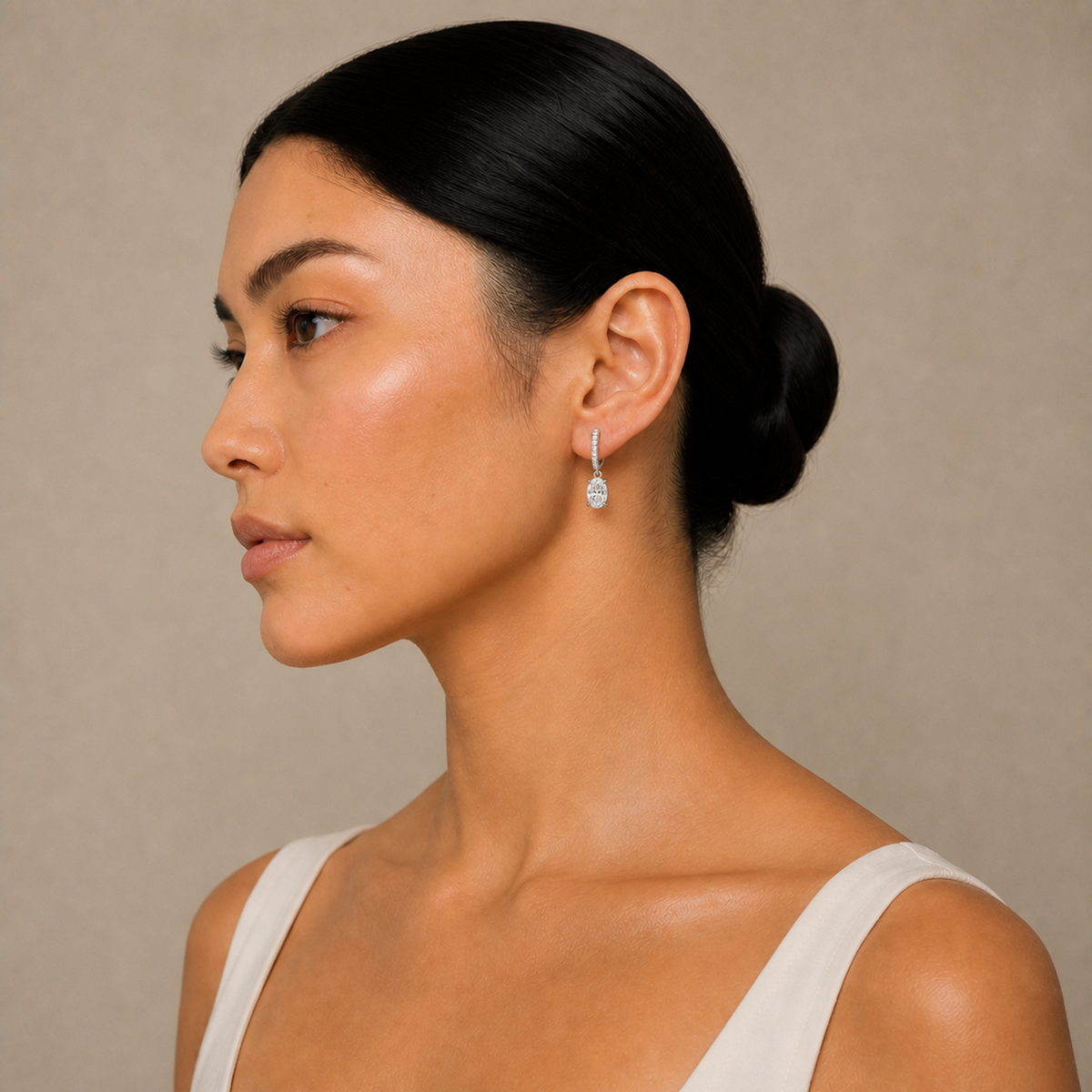 Fiorella Oval Accented Drop Huggie Hoop Lab-Grown Diamond Earrings in 14K White Gold, worn on ear