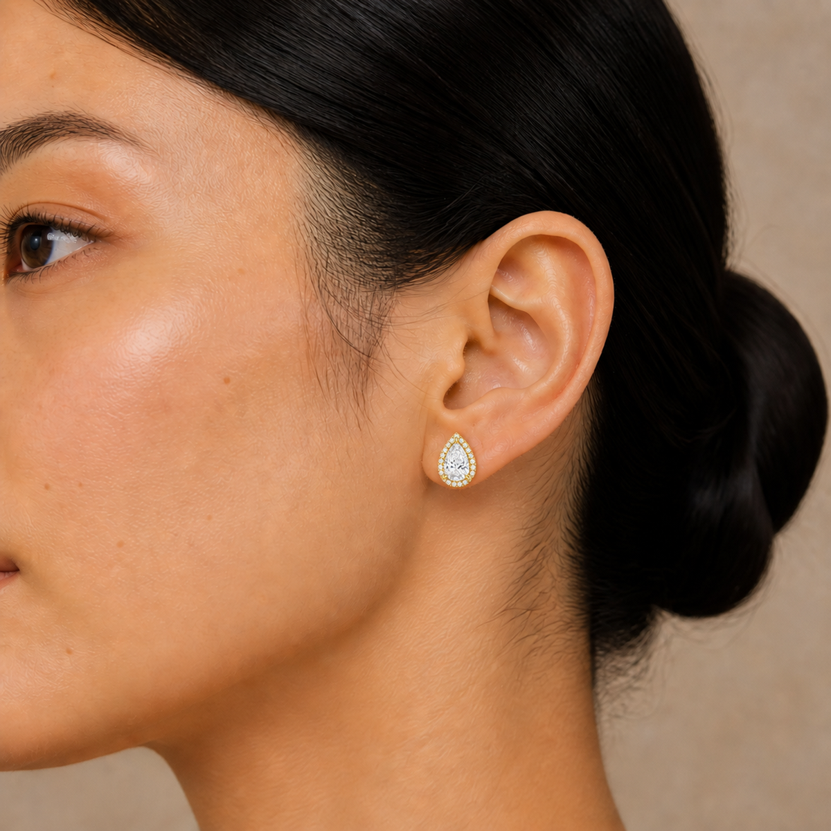 Seren Pear Halo Lab-Grown Diamond Stud Earrings in 14K Yellow Gold, worn on ear