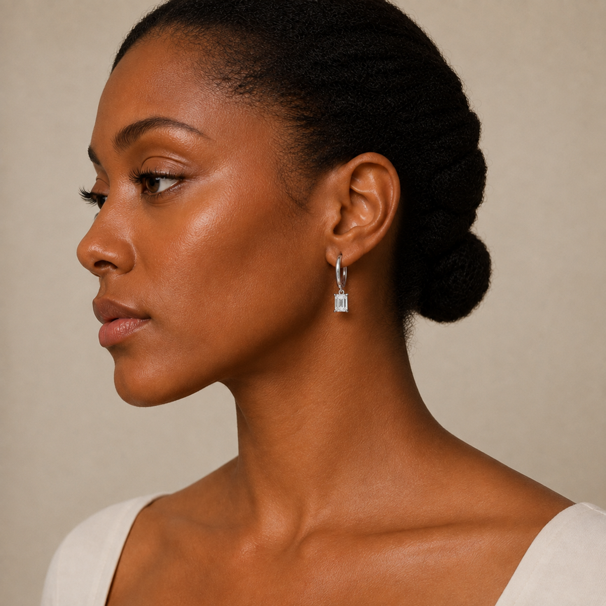 Cerelia Emerald Solitaire Drop Huggie Hoop Lab-Grown Diamond Earrings in Platinum, worn on ear