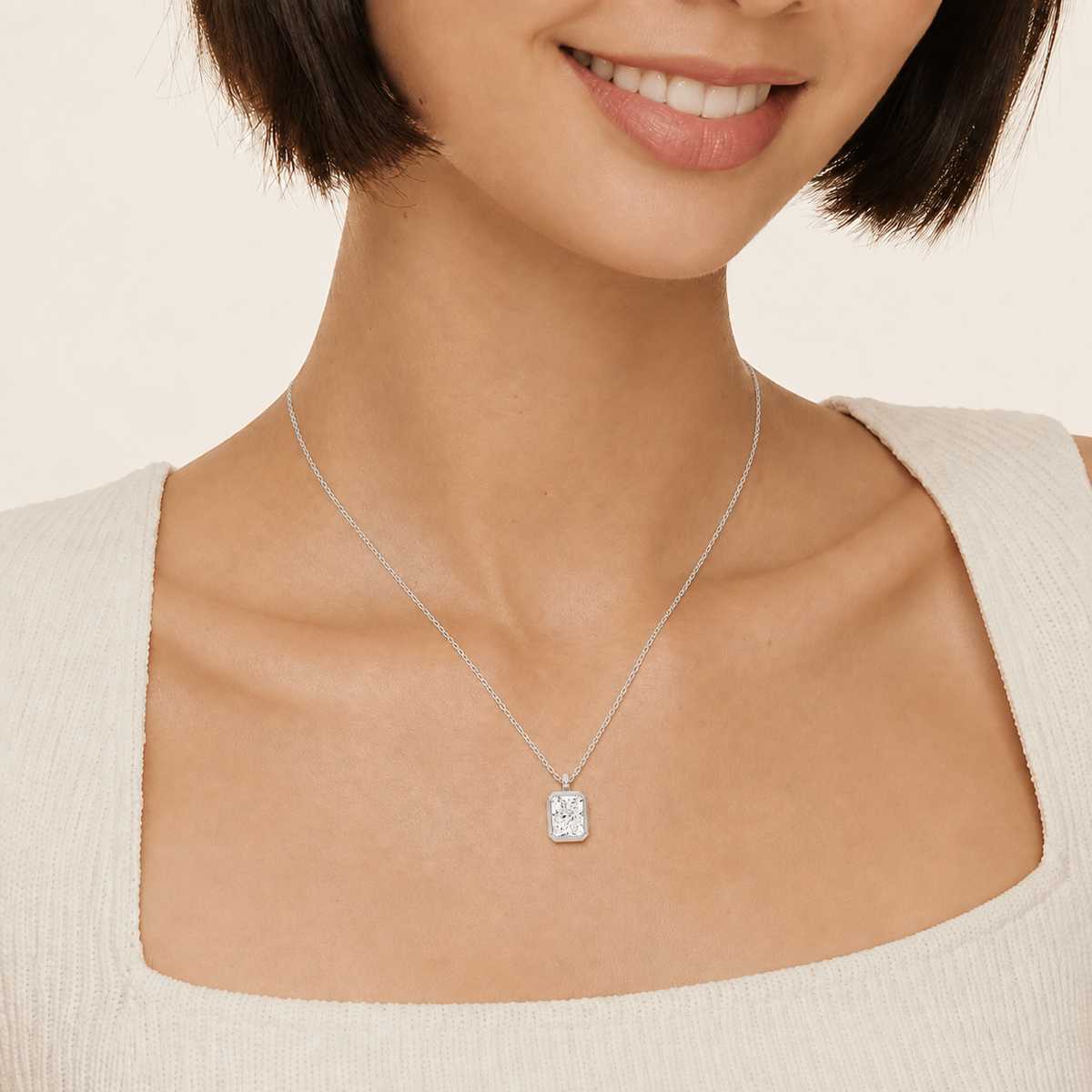 Stellaire Radiant Bezel Solitaire Lab-Grown Diamond Pendant Necklace in Platinum, worn on neck
