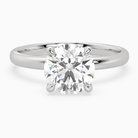 Round Petite Classic Solitaire in 18K White Gold main white