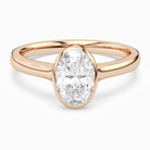 Oval Medium Tapered Bezel Solitaire in 14K Rose Gold main white