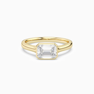 Emerald East-West Bezel Solitaire in 18K Yellow Gold main white